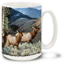 Majestic Elk against mountains & trees.
