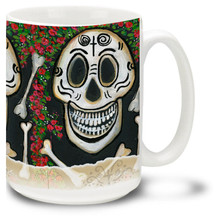 Colorful roses adorn this festive skull and bones mug celebrating the Day of the Dead