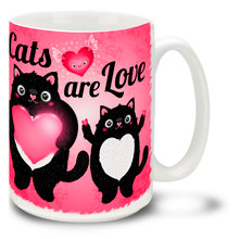 Get all warm and fuzzy with this charming, cat mug that tells it like it is! 15oz "Cats Are Love" cat mug is durable, dishwasher and microwave safe.