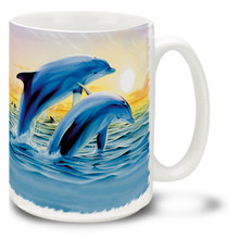 Colorful jumping dolphins mug features bright sunset colors. Jumping Dolphins Coffee Mug is dishwasher and microwave safe.