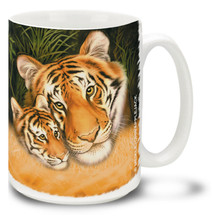A proud and beautiful mother tiger, known as a tigress, is responsible for raising the tiger cubs as well as teaching them to hunt and fend for themselves. Prowl through your day with this colorful tiger mug. 15oz Cub and Mama Tiger coffee mug is durable, dishwasher and microwave safe.