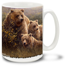 An grizzly bear family in a field. Mother and curious cubs make this a special bear mug! Grizzly bears are also known as the North American brown bear. 15oz Grizzly Bear Coffee Mug is dishwasher and microwave safe.