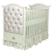 Bordeaux Crib
Finish: Snow
Fabric: AFK Majestic Lilac Mist
Tufting Option: Crystal Tufting
Appliquéd Moulding Option: Crown Moulding in Silver Gilding