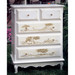 French Tall Chest
Finish: Antico White
Trim Out: Brown Gingham
Hand Painted Motif: Toile Brown
Knobs: Glass Knobs with Gold Base