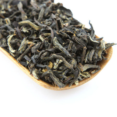 This is a traditional black tea made from the leaves of ancient Yunnan pu-er trees.