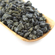 Gunpowder is a form of green Chinese tea which each leaf has been rolled into a small round pellet.