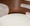 Cosini 24" Mid-Century Modern Counter Stool with Swivel in Walnut Wood and Cream Faux Leather with Round Chrome Metal Footrest- Set of 2 — lifestyle photo 5