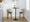 Cosini 24" Mid-Century Modern Fixed-Height Counter Stool with Swivel in Light Grey Wood and Black Faux Leather with Round Black Metal Footrest- Set of 2 — lifestyle photo 4