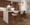 Curvo counter stool in Walnut Wood, Cream Fabric, Chrome, featuring swivel and wood frame