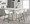 Daniella Industrial Fixed-Height Counter Stool in Black Metal and White Faux Leather- Set of 2 — lifestyle photo 3