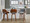 Fabrizzi counter stool in Walnut Wood, Chrome Metal, Grey Noise Fabric, featuring swivel and upholstered seat