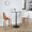 Gianna counter stool in Walnut Wood, Chrome Footrest, White PU, featuring swivel and wood frame