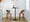 Grotto counter stool in Walnut Wood, Black Metal, Cream PU, featuring swivel and wood frame