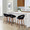 Grotto Upholstered 24" Contemporary Fixed-Height Counter Stool with Swivel in Walnut Wood and Black Velvet with Round Black Metal Footrest- Set of 2 — lifestyle photo 1