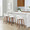 Grotto counter stool in Walnut Wood, White Velvet, Black Metal, featuring swivel and wood frame