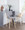 Stella counter stool in Natural Wood, Light Grey Fabric, Black Metal, featuring swivel and upholstered seat
