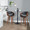 Symphony 24" Mid-Century Modern Fixed-Height Counter Stool with Swivel in Walnut Wood and Black Faux Leather with Round Chrome Metal Footrest- Set of 2 — lifestyle photo 4