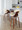 Curvo counter stool in Walnut Wood, Cream PU, Chrome Metal, featuring swivel and wood frame