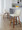Toriano Mid-Century Modern Fixed-Height Counter Stool in Walnut Wood and Cream Fabric with Square Black Metal Footrest- Set of 2 — lifestyle photo 2