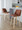 Tintori counter stool in Natural Wood, Camel PU, Chrome Metal, featuring swivel and wood frame