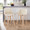 Toriano 24" Contemporary Fixed-Height Counter Stool with Swivel in Natural Wood and Cream Faux Leather with Square Chrome Metal Footrest- Set of 2 — lifestyle photo 2