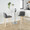 Toriano 24" Contemporary Fixed-Height Counter Stool with Swivel in Natural Wood and Grey Faux Leather with Square Chrome Metal Footrest- Set of 2 — lifestyle photo 2