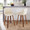 Toriano 24" Mid-Century Modern Fixed-Height Counter Stool with Swivel in Walnut Wood and Cream Faux Leather with Square Chrome Metal Footrest- Set of 2 — lifestyle photo 1