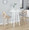 Charlotte counter stool in Whitewashed Wood, Chrome Metal, Light Grey Fabric, featuring swivel and upholstered seat