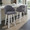 Dahlia 26" Contemporary Fixed-Height Counter Stool with Swivel in White Wood and Grey Fabric with Round Chrome Footrest- Set of 2 — lifestyle photo 2