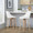 Diana 26" Contemporary Fixed-Height Counter Stool with Swivel in Zebra Wood and White Faux Leather with Round Chrome Metal Footrest- Set of 2 — lifestyle photo 2