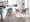 Fabrizzi counter stool in Walnut Wood, Blue Noise Fabric, Black Metal, featuring metal footrest