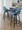 Fabrizzi counter stool in Walnut Glazed Wood, Blue Noise Fabric, Black Metal, featuring swivel and wood frame