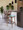 Folia 26" Mid-Century Modern Fixed Height Counter Stool with Swivel in Walnut, Teal Fabric and Black Metal Footrest- Set of 2 — lifestyle photo 7