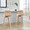 Folia 26" Contemporary Fixed-Height Counter Stool with Swivel in Zebra Wood and Cream Faux Leather with Round Chrome Metal Footrest- Set of 2 — lifestyle photo 4