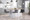 Fuji 26" Contemporary High Back Counter Stool in Stainless Steel and Grey Faux Leather- Set of 3 — lifestyle photo 2