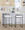 Fuji 26" Contemporary Stackable Counter Stool in Black Metal with White Faux Leather Cushion- Set of 3 — lifestyle photo 2