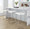 Fuji 26" Contemporary Stackable Counter Stool in Brushed Stainless Steel with White Faux Leather- Set of 3 — lifestyle photo 2