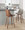 Gianna counter stool in Walnut Wood, Chrome Metal, Light Grey PU, featuring swivel and metal footrest