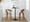 Grotto 26" Mid-Century Modern Fixed-Height Counter Stool with Swivel in Walnut Wood and Cream Faux Leather with Round Chrome Metal Footrest- Set of 2 — lifestyle photo 3