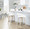 Grotto Upholstered 26" Contemporary Fixed-Height Counter Stool with Swivel in Whitewashed Wood and White Faux Leather with Round Black Metal Footrest- Set of 2 — lifestyle photo 1