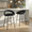 Grotto counter stool in Black Metal, Black PU, Gold Metal, featuring swivel and metal footrest