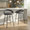 Grotto counter stool in Black Metal, Grey PU, Gold Metal, featuring swivel and metal footrest