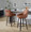 Hannah counter stool in Walnut Glazed Wood, Camel PU, Black Metal, featuring swivel and wood frame