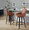Hannah counter stool in Walnut Glazed Wood, Camel PU, Black Metal, featuring swivel and wood frame