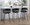 Jie counter stool in Black Metal, Gold Metal, Black PU, featuring metal footrest
