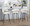 Jie counter stool in Black Metal, Gold Metal, White PU, featuring metal footrest