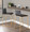 Mara counter stool in Gold Metal, Black PU, featuring metal footrest
