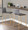 Mara counter stool in Gold Metal, Grey PU, featuring metal footrest