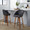 Matisse High Back 26" Contemporary Fixed-Height Counter Stool with Swivel in Walnut Wood and Black Faux Leather with Round Black Metal Footrest- Set of 2 — lifestyle photo 2