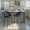 Renee Upholstered 26" Contemporary Fixed-Height Counter Stool with Swivel in Black Metal and Black Faux Leather with Suqare Gold Metal Footrest- Set of 2 — lifestyle photo 2